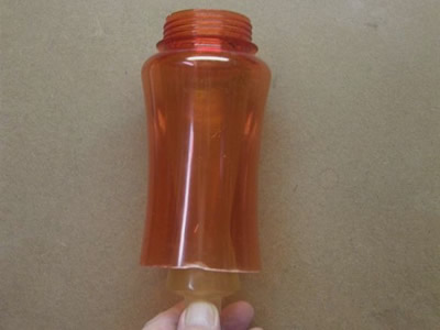 Bottle slides over the feeder