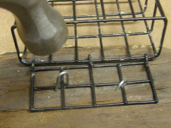 Suet cage is attached to the top piece